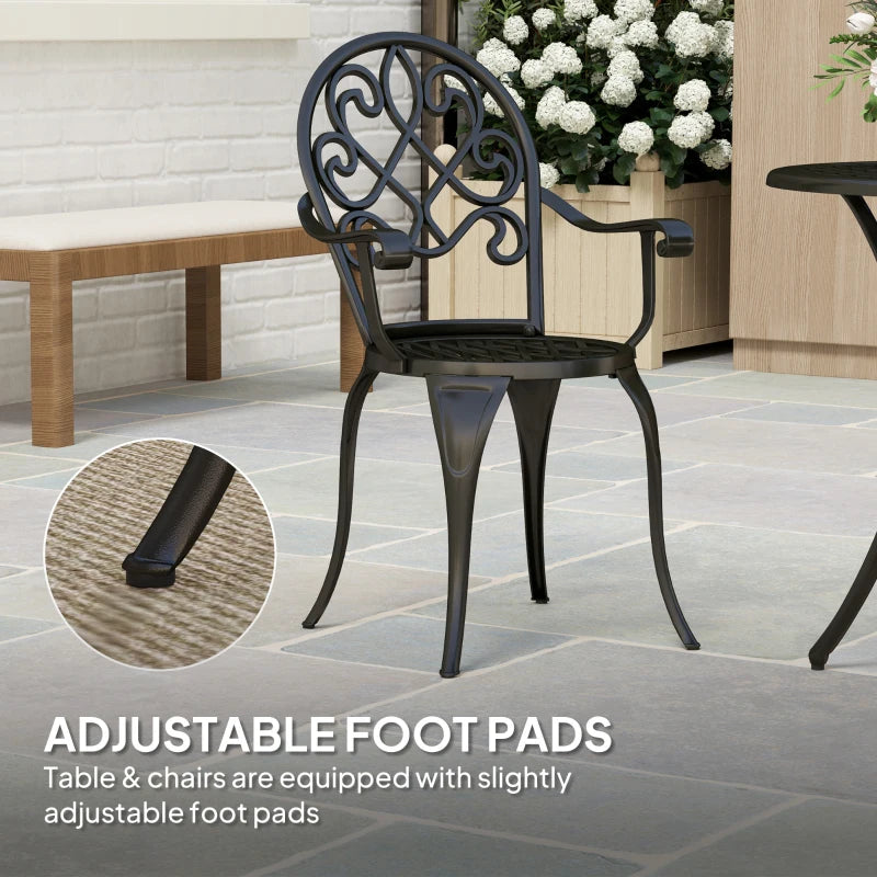 Black garden bistro chair with ornate back and adjustable foot pad detail