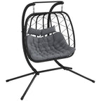 Black hanging egg chair with gray tufted cushion and two attached headrest pillows