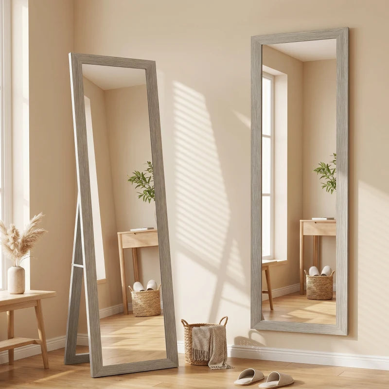 Two grey full-length mirrors with rectangular glass, standing in room