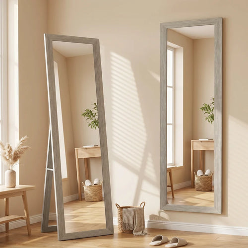 Two grey full-length mirrors with rectangular glass, standing in room