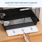 Black metal bird cage with slide-out bottom tray for easy cleaning
