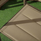 Close-up of khaki chair seat mesh panels with dark frame edging