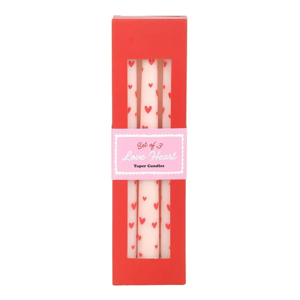 Set of three pink taper candles in box with red heart prints