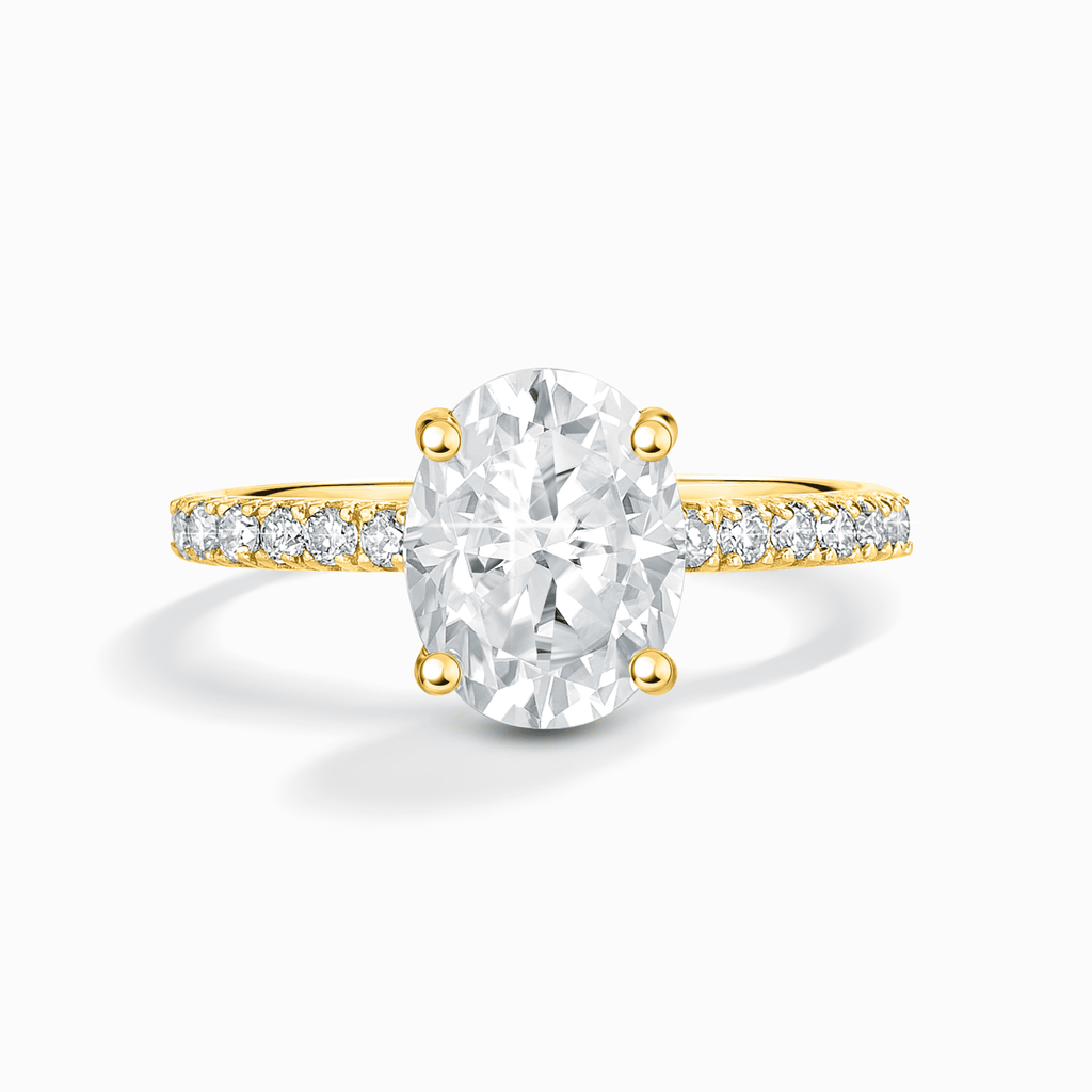 Oval moissanite engagement ring with pavé band in 18k gold vermeil