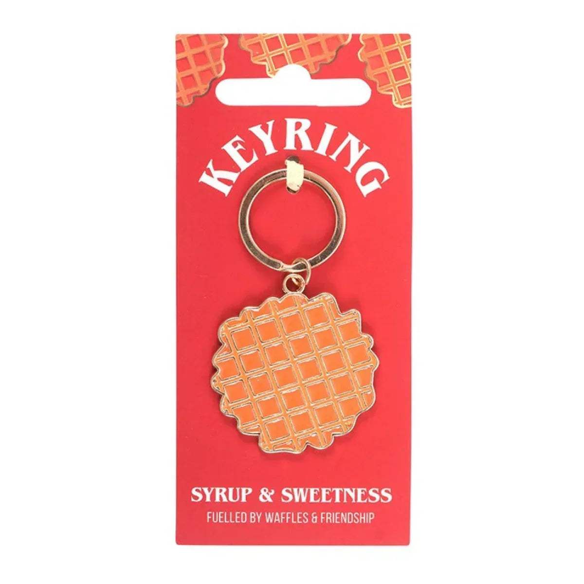 Waffle-shaped keyring charm with orange grid waffle and metal ring on card