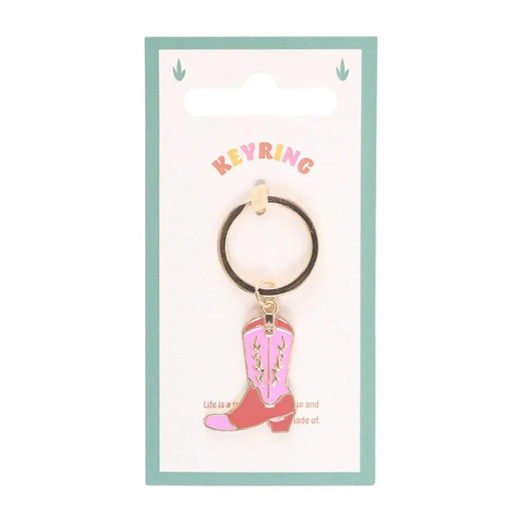 Pink cowboy boot keyring charm on gold-tone ring, in teal retail packaging