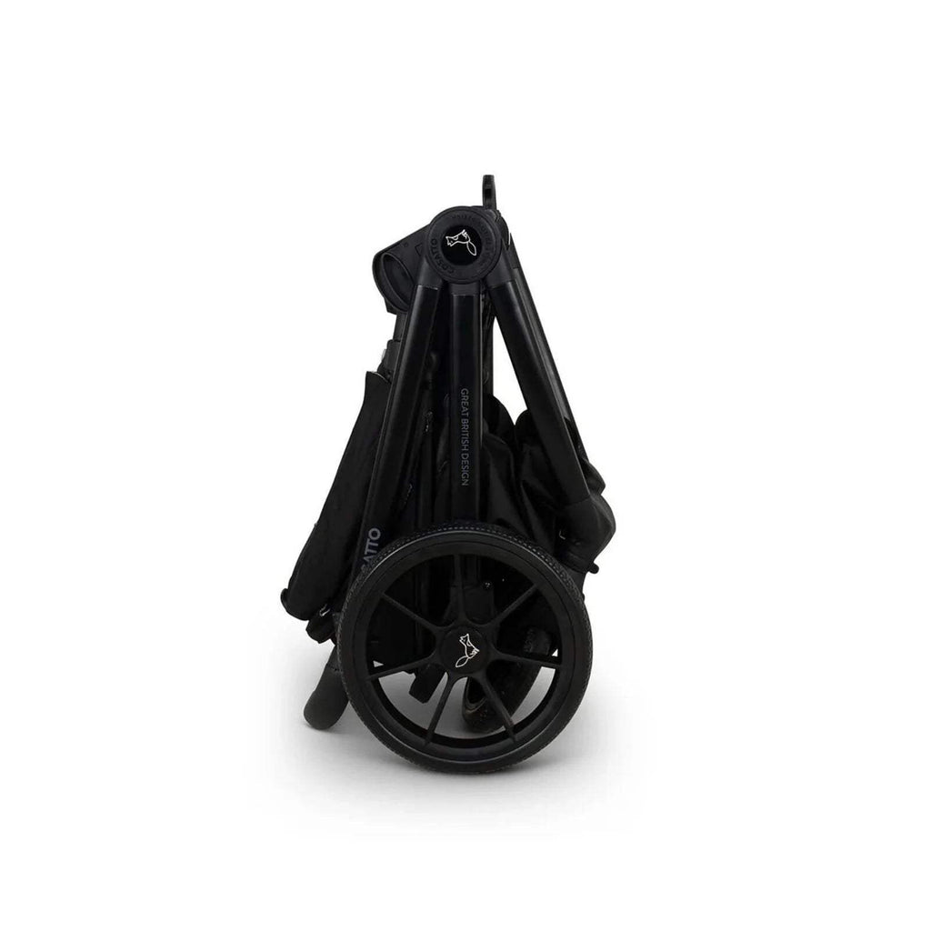 Black stroller frame with large wheels and folded rear section