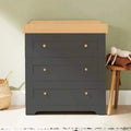 Slate changing chest with honey oak top, 3 drawers and round brass knobs