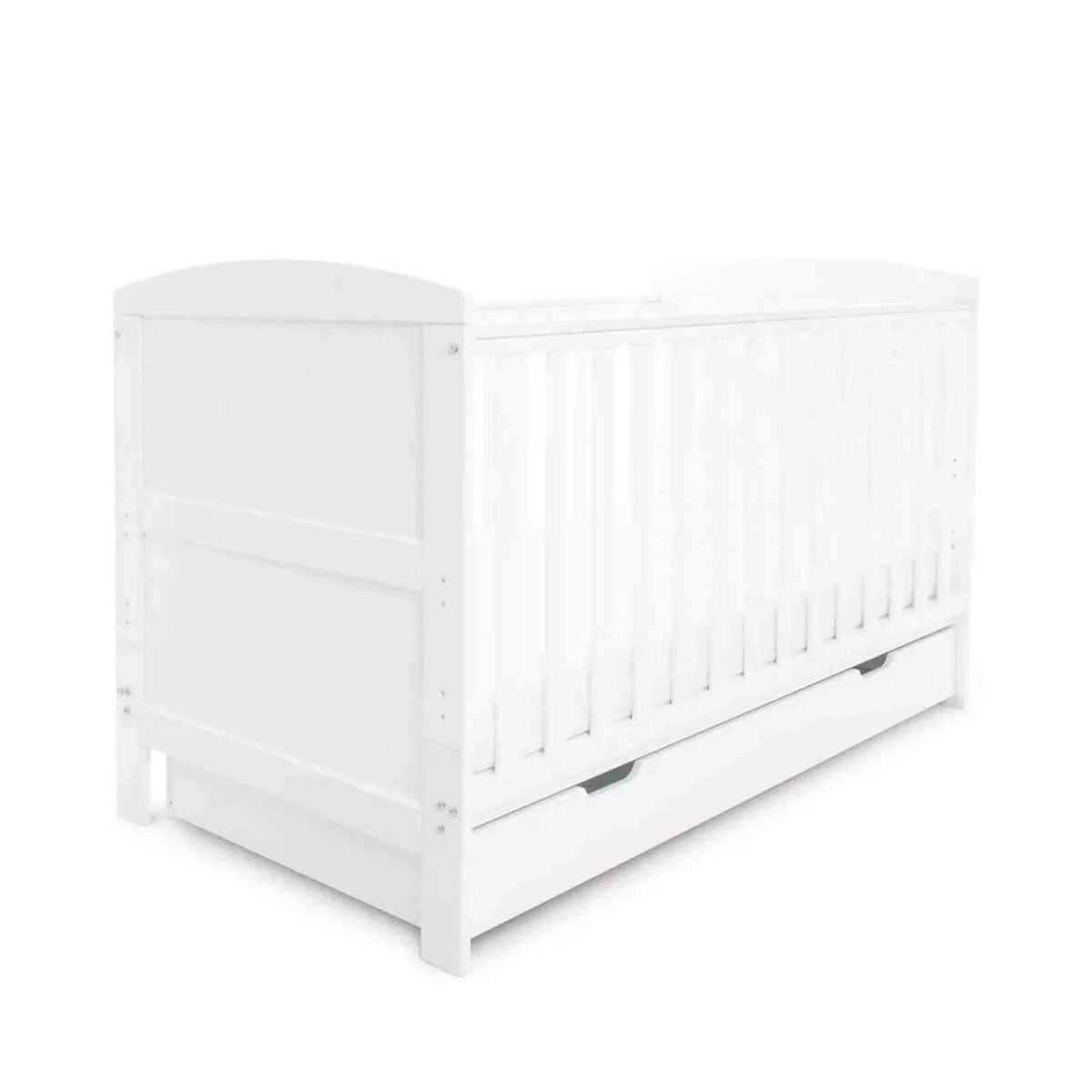 White cot bed with slatted sides and panel ends
