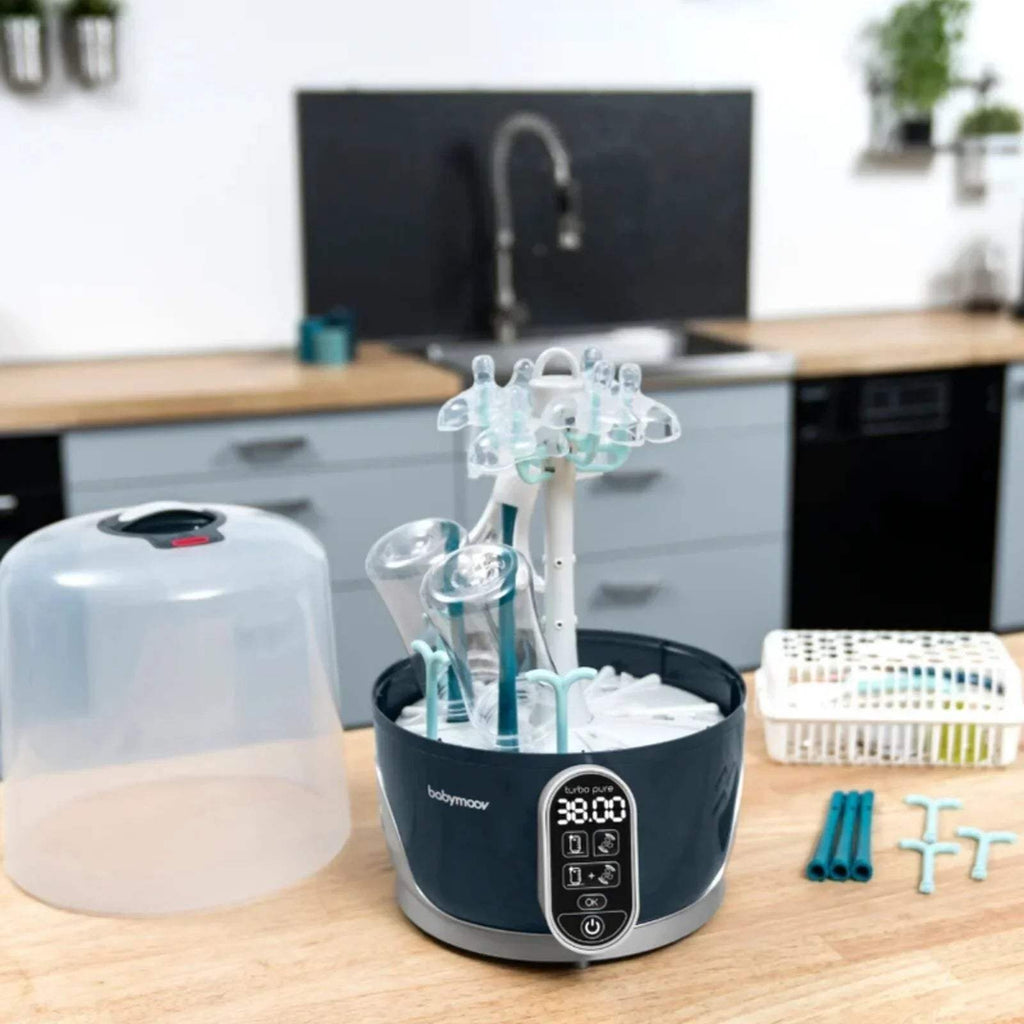 Babymoov Turbo Pure steriliser and dryer on base with bottle rack and control panel