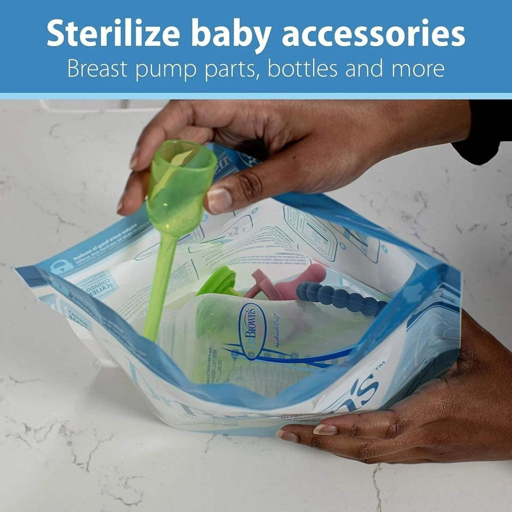 Steriliser bag covering baby bottle and breast pump parts during microwave use