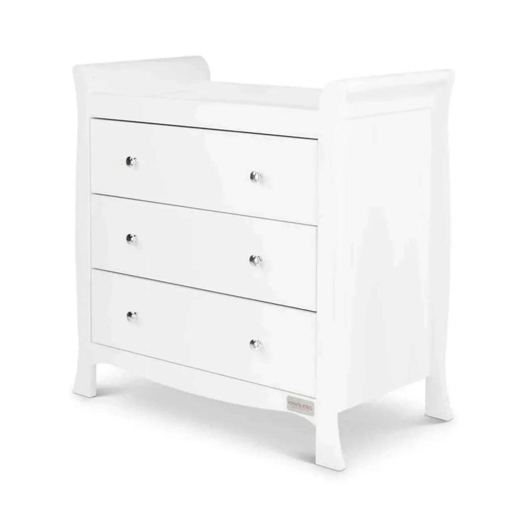 White nursery dresser with three drawers and knob pulls