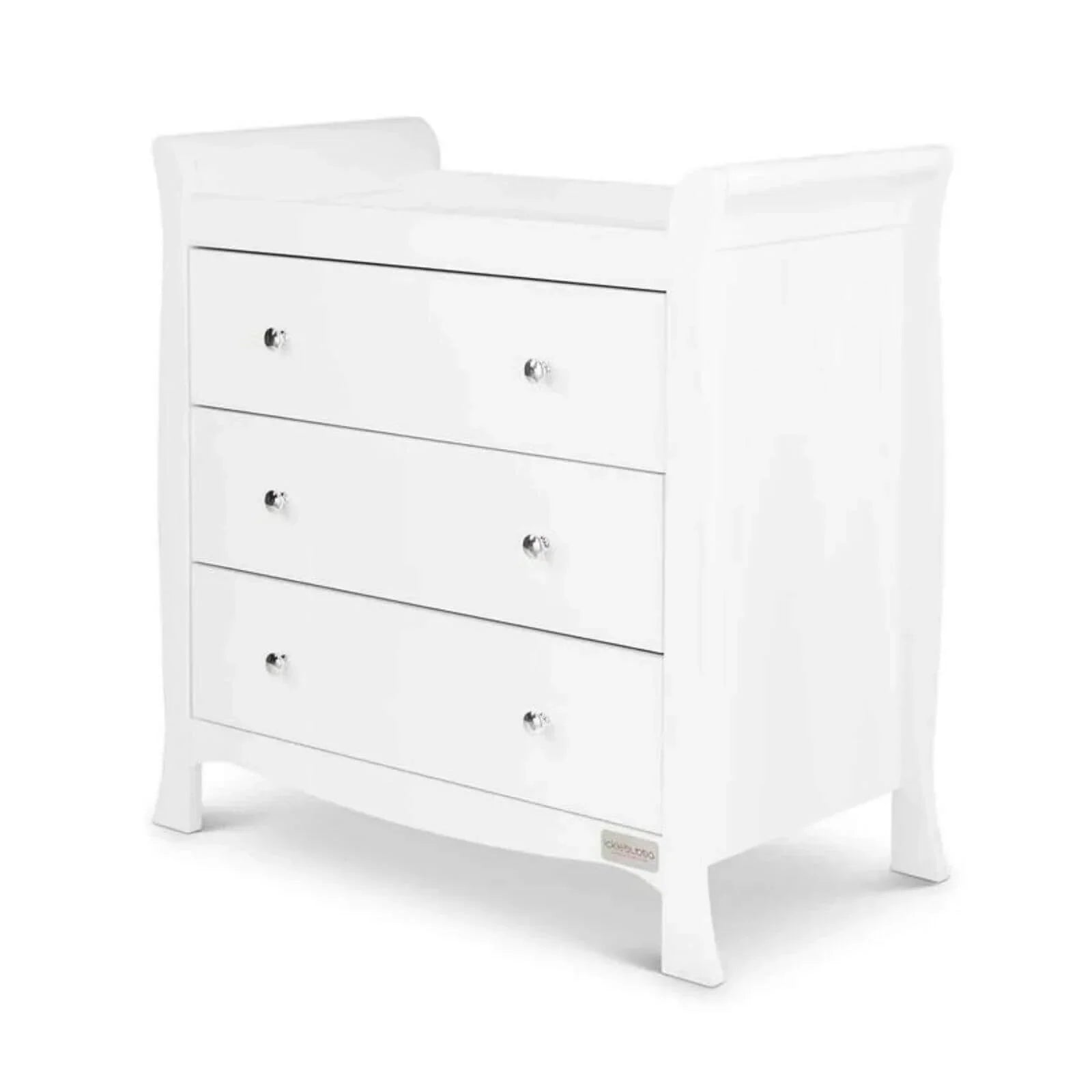 White child dresser with three drawers and round metal knobs, angled view.