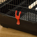 Bird cage slide tray latch with orange clip on black base