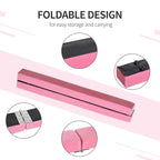 Foldable pink balance beam with textured underside and hinge for easy storage and carrying.