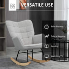 Light grey nursery glider rocking chair with tufted back and curved wood base