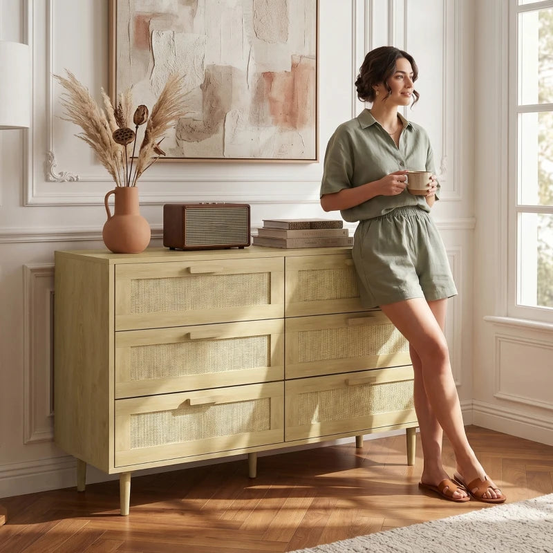 Light oak 6-drawer dresser with rattan-front drawers and wooden feet; side view.