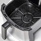 Open air fryer basket insert with perforated tray and circular heating plate
