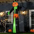 Tall inflatable pumpkin-ghost with built-in LED lights, black outfit and green hands, outdoor display