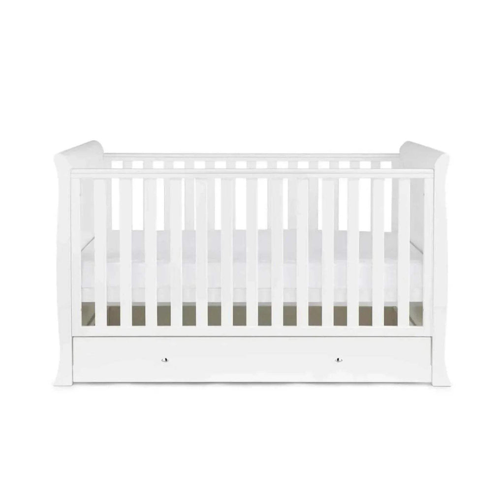White baby cot front view with vertical slats and drawer storage