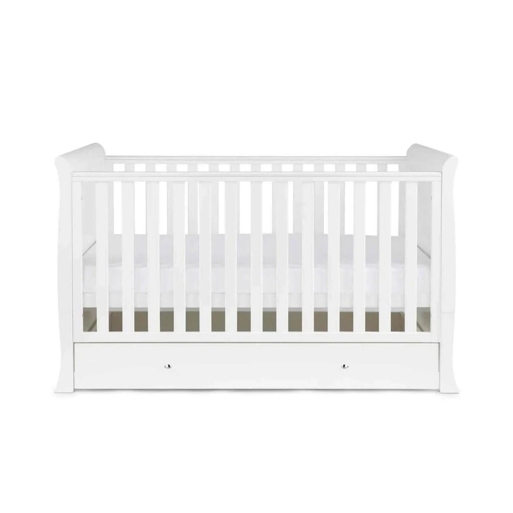 White wooden baby cot with vertical slats and drawer base, front view