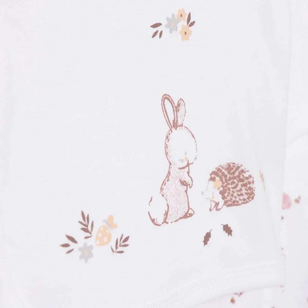 Ecru long-sleeve top with pink bunny and hedgehog graphic print