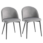 Set of 2 grey upholstered dining chairs with arched backs and black metal legs