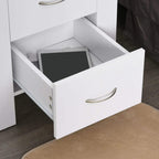 White bedside table with drawer pulled out, showing inner storage compartment