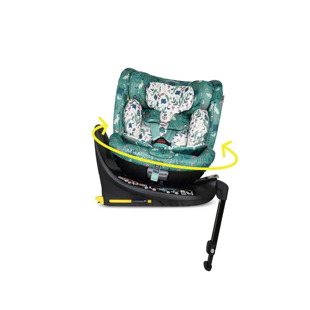 Infant car seat showing green side panels, padded headrest, and harness