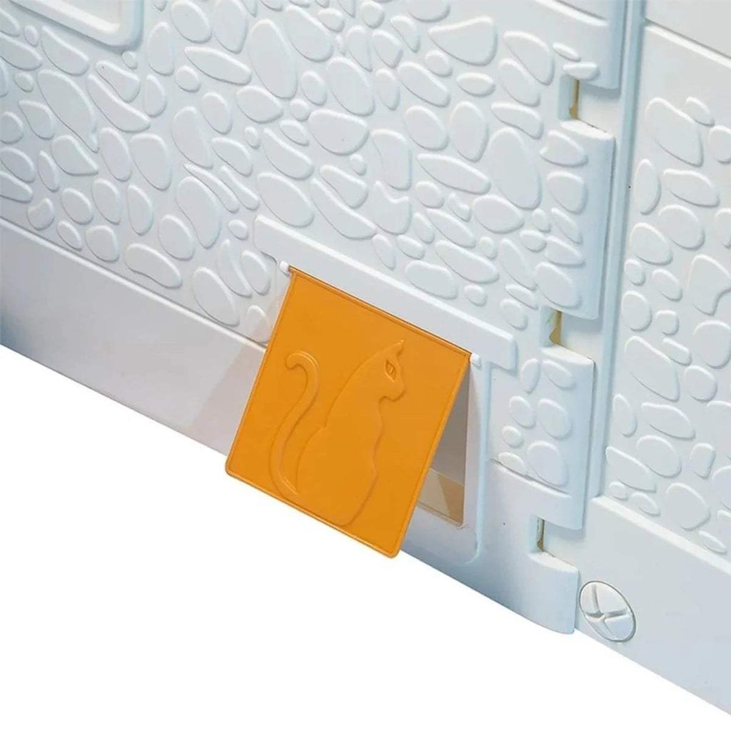 Close-up of blue-textured playhouse wall with orange latch panel and hinges