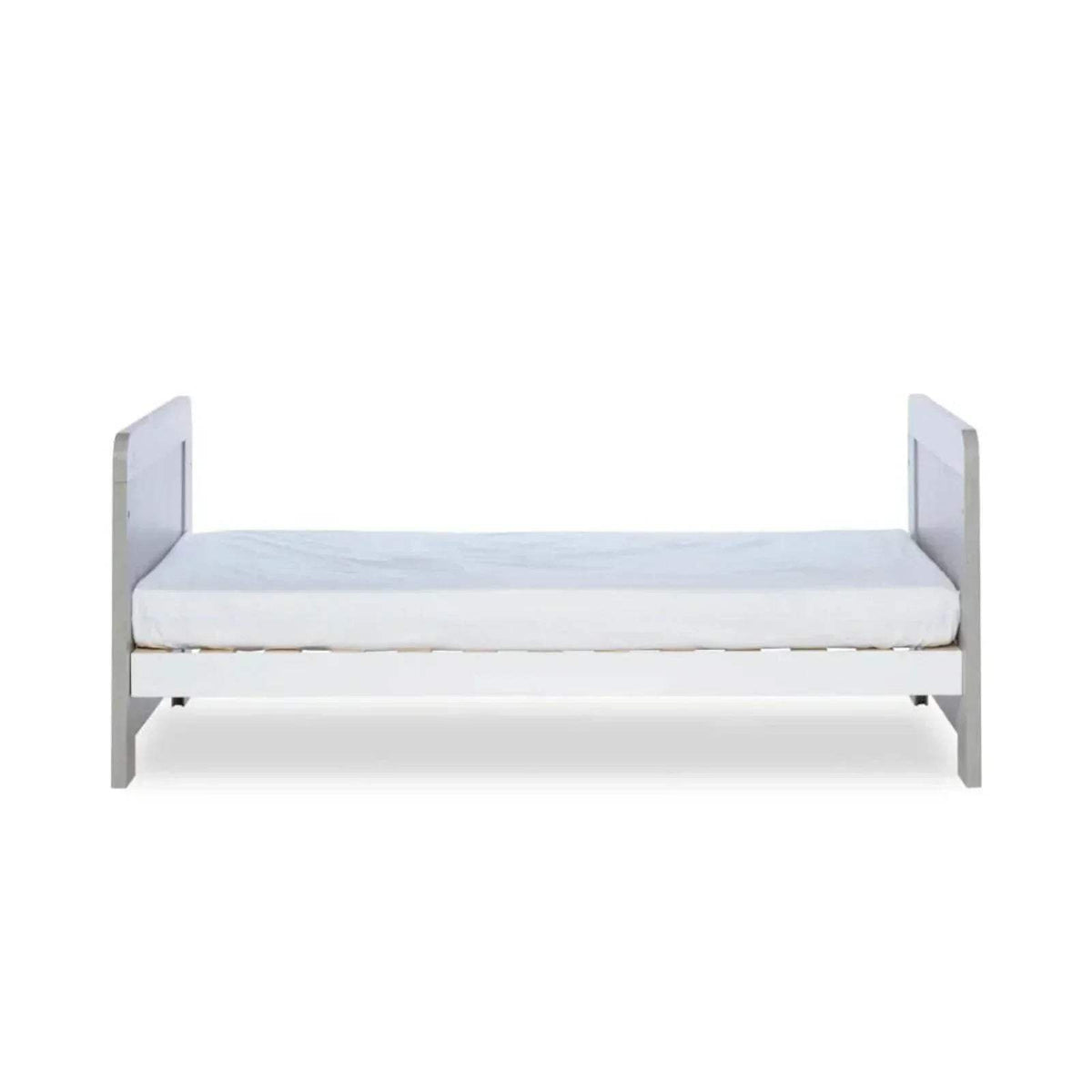 Cot bed with white padded base and ash grey ends; mattress not included.