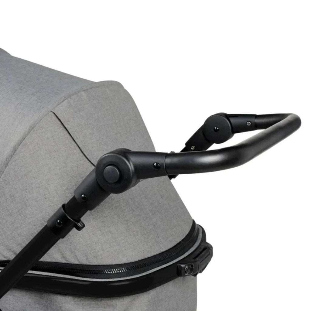 Grey stroller seat with black armrest and handle bar