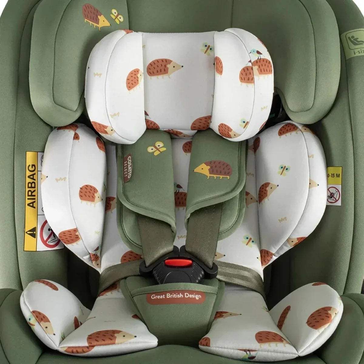 Olive-green car seat interior with animal-print padding and red chest buckle