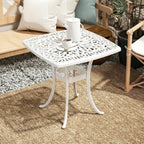 White cast aluminium patio end table with lattice top, umbrella hole, curved pedestal legs