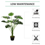 Artificial monstera plant in black pot with green split leaves and moss filling