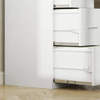 Close-up of white cabinet drawers with extended rails and pull handles