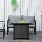Black square propane fire pit table with glass wind guard and visible flames