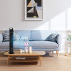 Black standing tower fan on the floor with airflow stream