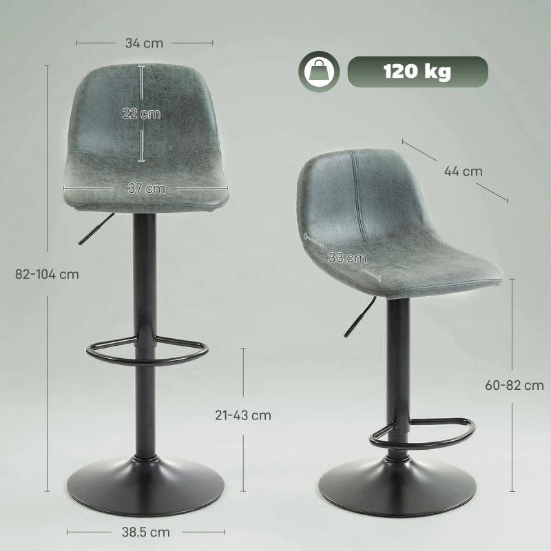Pair of green swivel bar stools with footrest rings and curved upholstered seats