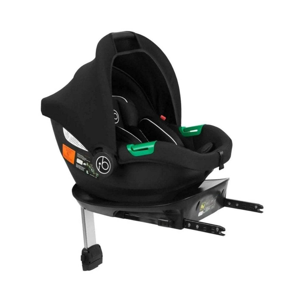 Black i-Size infant car seat with ISOFIX base, rear-facing and green recline handles