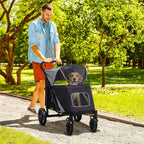 Black pet stroller with front mesh door, canopy, and four wheels; dog seated inside