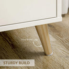 White cabinet supported by light pine wood legs, solid bottom profile