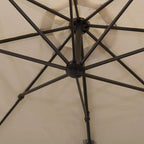 Cantilever umbrella hub with beige canopy fabric and black cross support ribs
