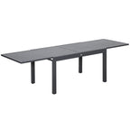 Dark grey extendable outdoor dining table with slatted tabletop and four sturdy legs