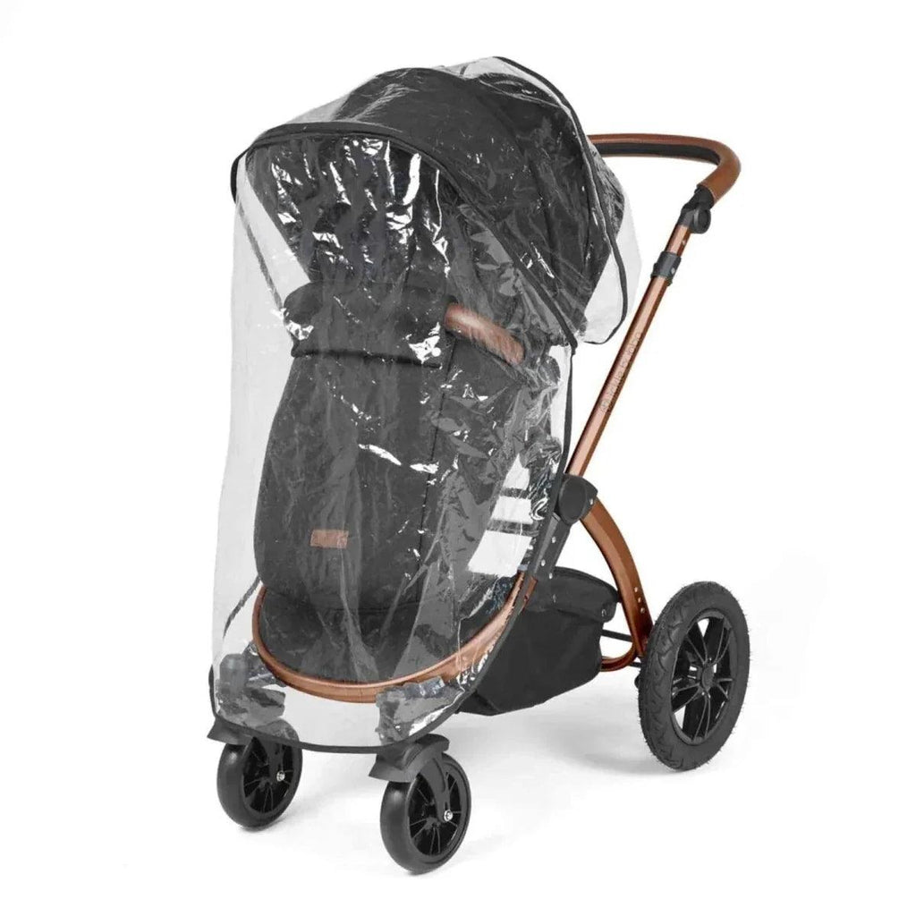 Black stroller with clear rain cover and brown handlebar