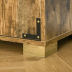 Cabinet base corner with sturdy feet and gold-toned corner brackets in natural wood finish