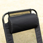 Black folding recliner patio chair with padded backrest and curved carry handle