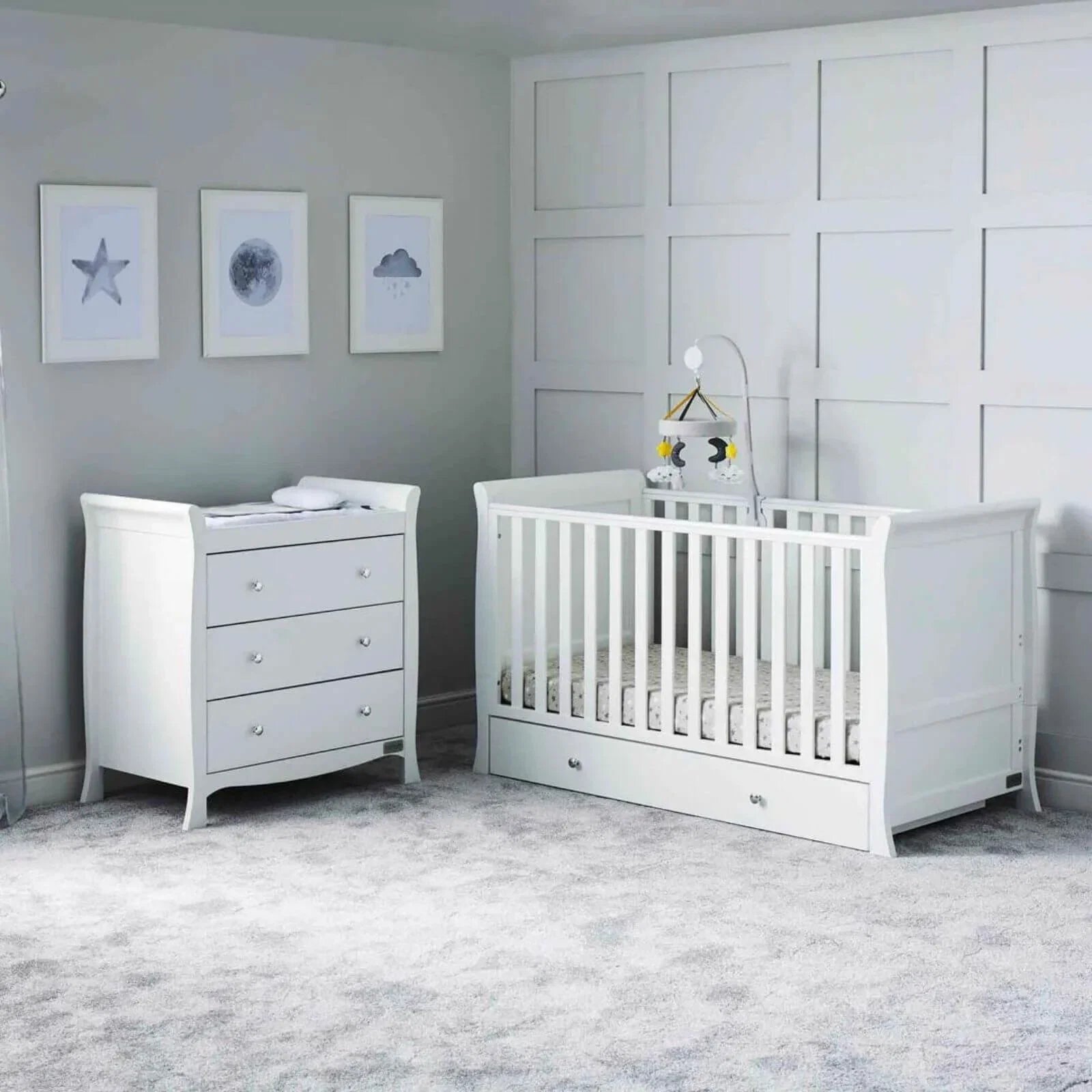 White baby cot with matching chest of drawers, vertical rail front