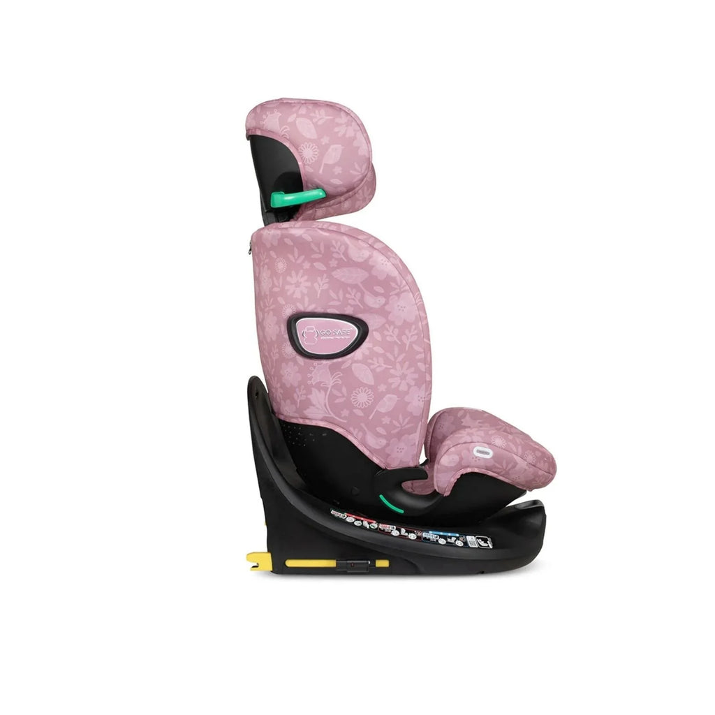 Light pink patterned car seat with padded insert and green adjustment lever, side view