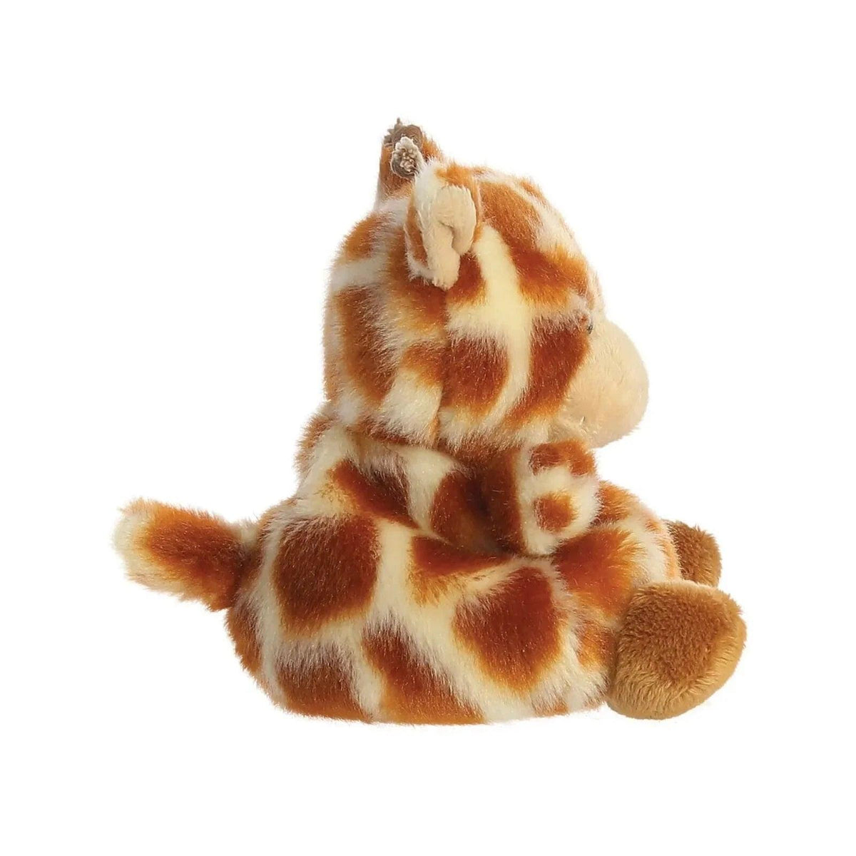 Giraffe soft toy close view, brown-and-cream spots, head turned with stitched facial features